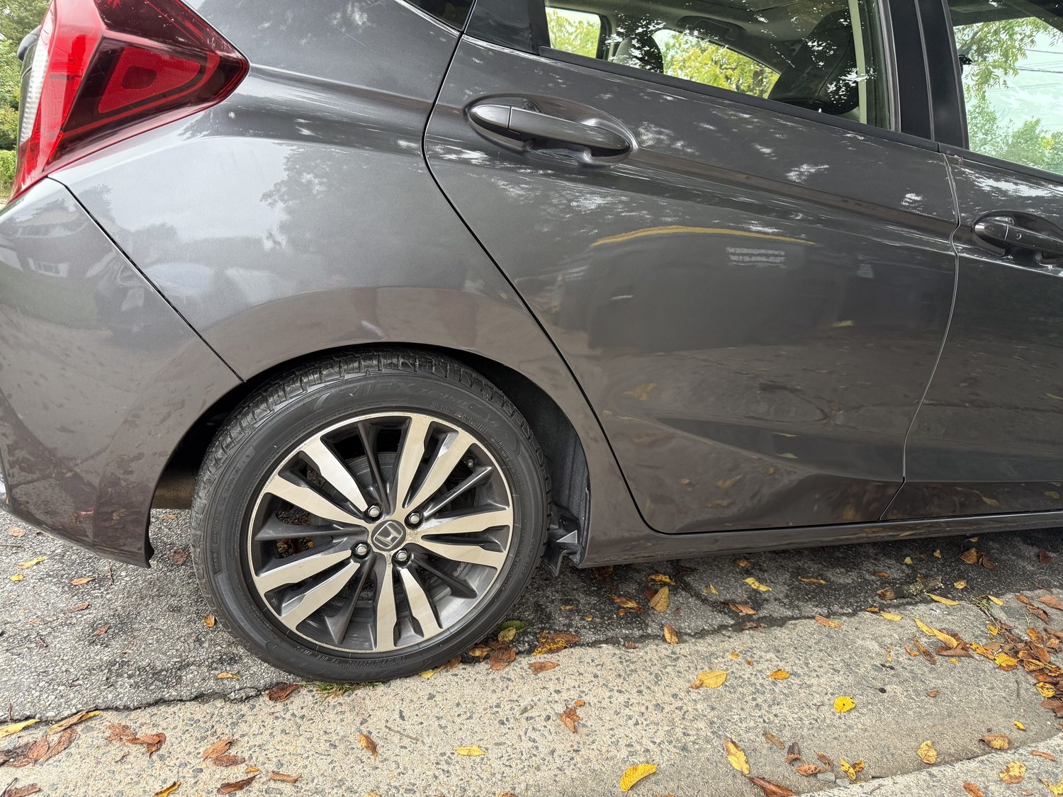 Same gray Honda rear door and quarter panel after repair